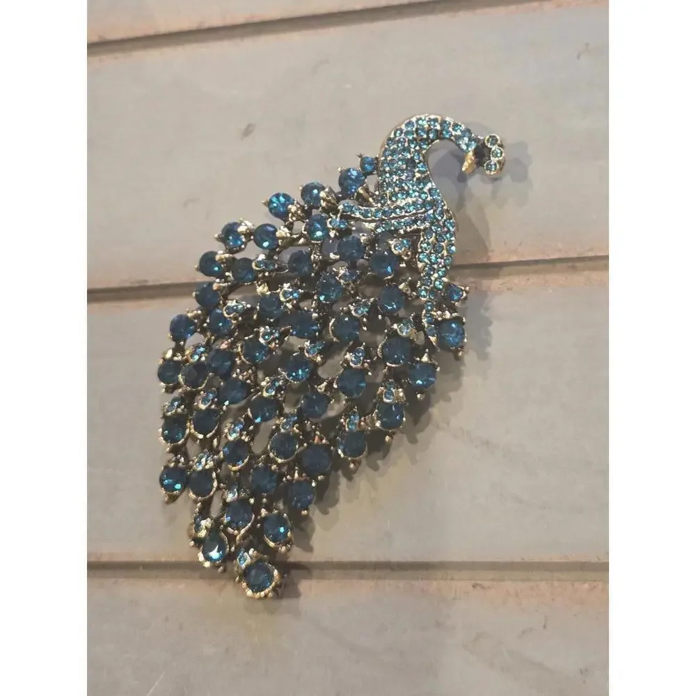 Blue green rhinestone jeweled peacock brooch